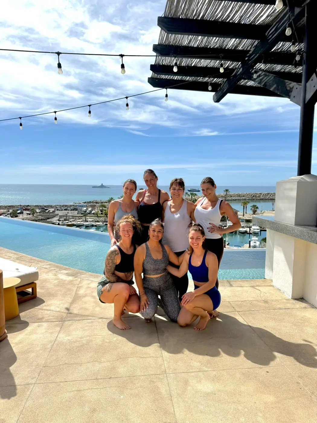 Baja Wellness Retreat guests together on the rooftop in San José del Cabo