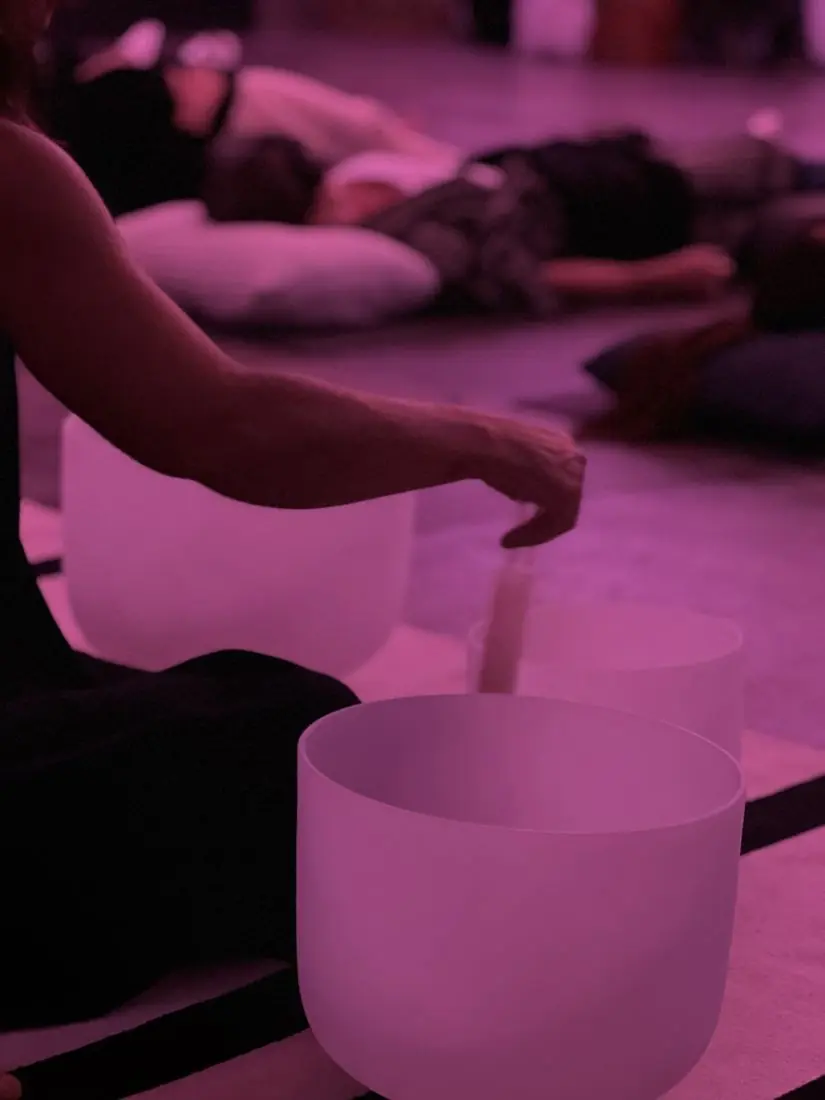 Crystal singing bowls during sound healing