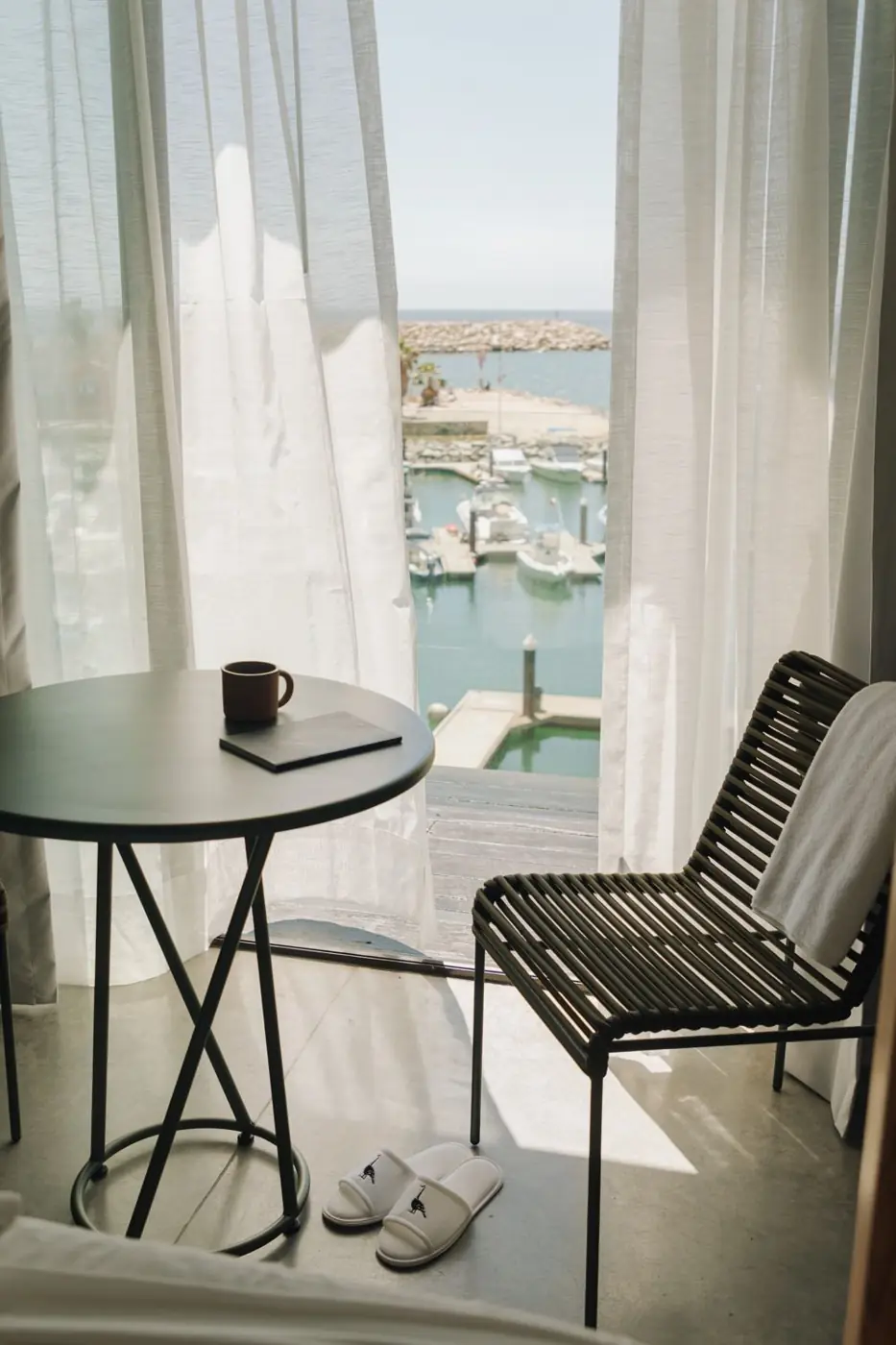 A quiet corner of a guest room overlooking the marina