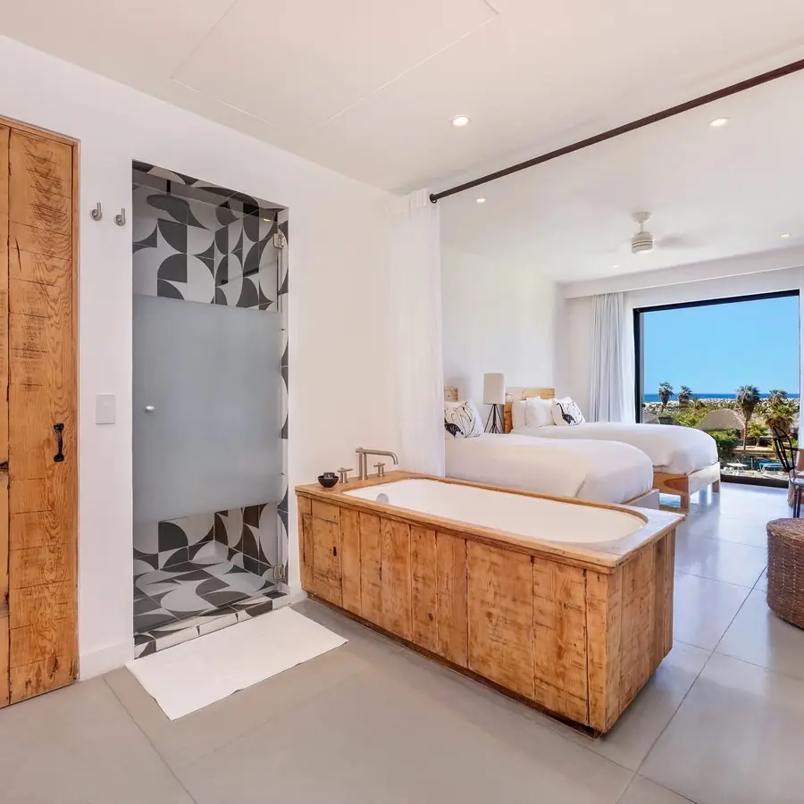 Two-bed room with a soaking tub