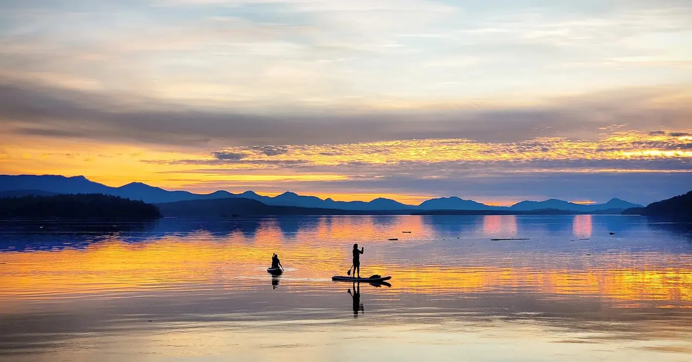 Paddleboarders at sunset off Galiano Island