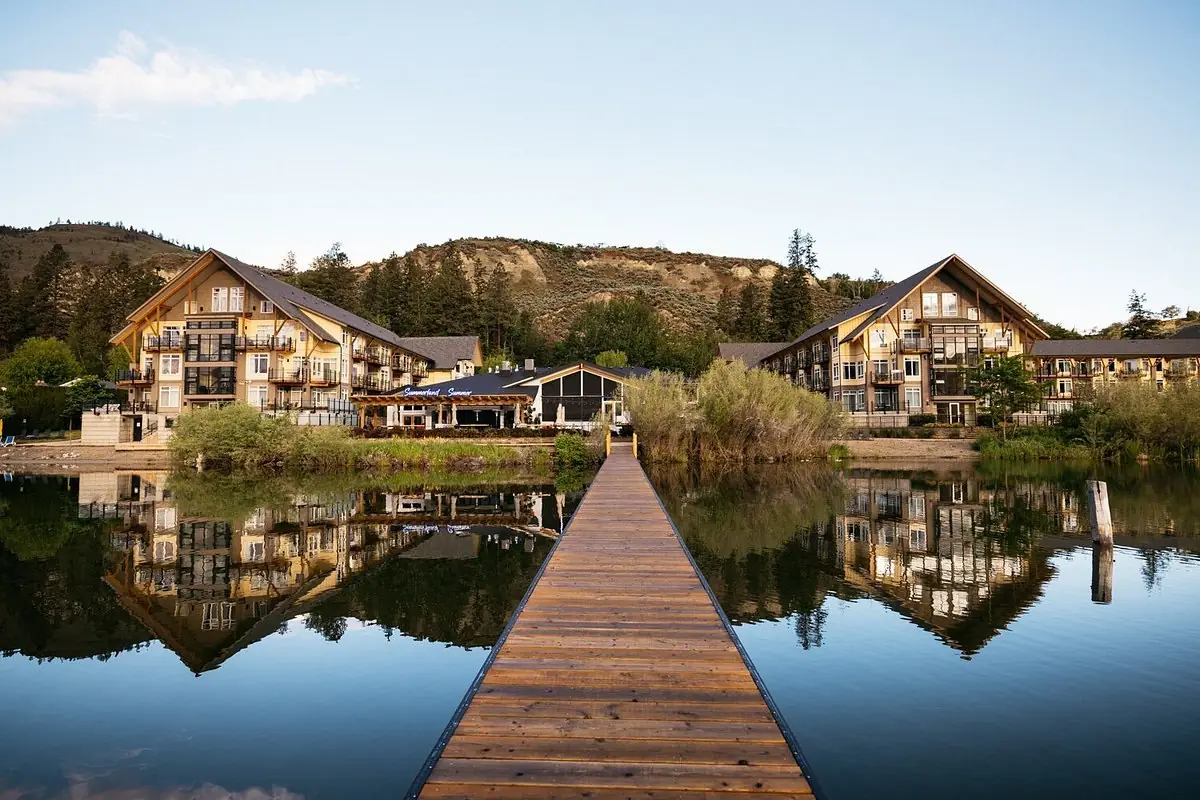 Summerland Waterfront Resort reflected in Okanagan Lake, seen from the dock
